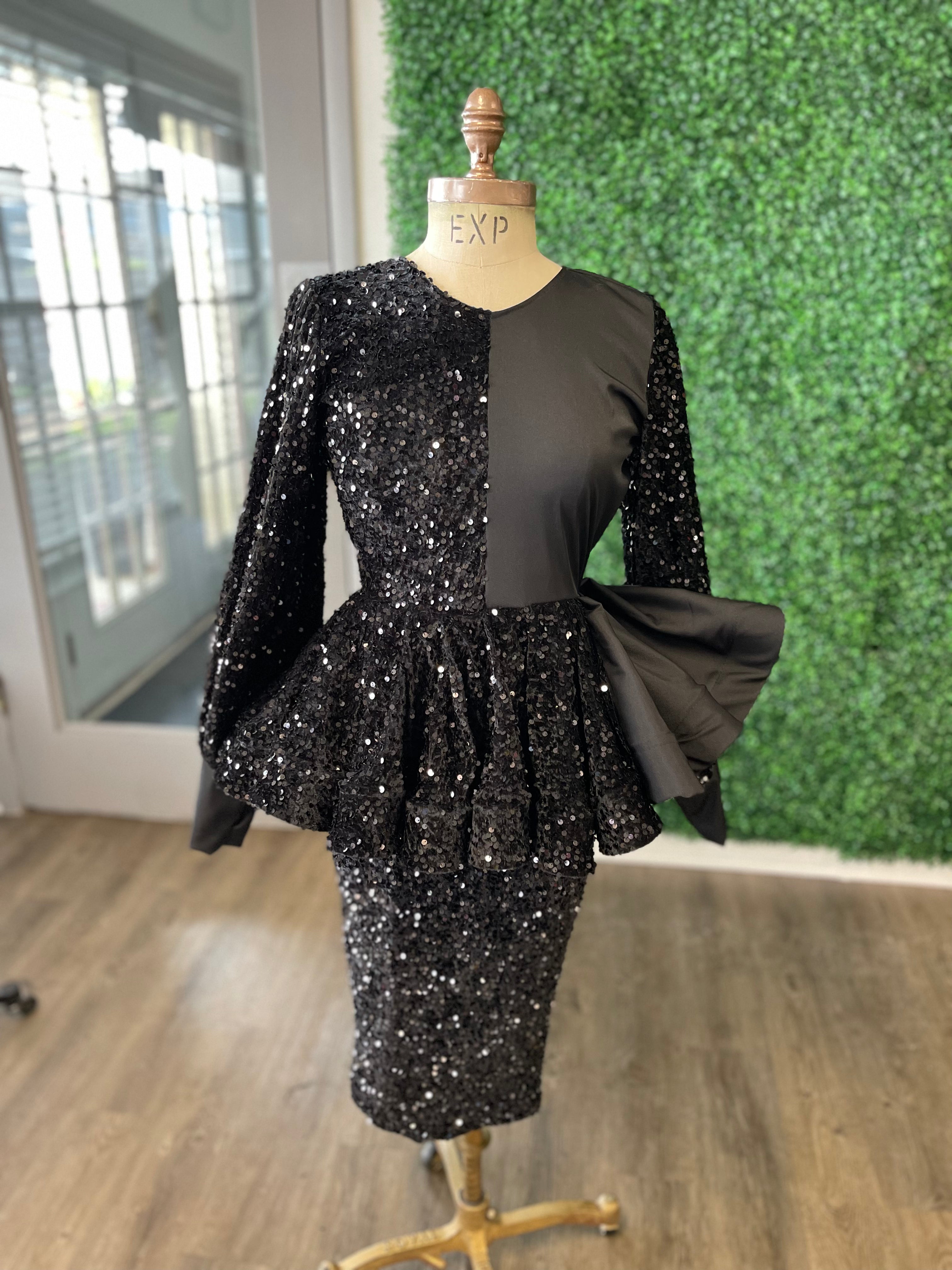 black peplum dress